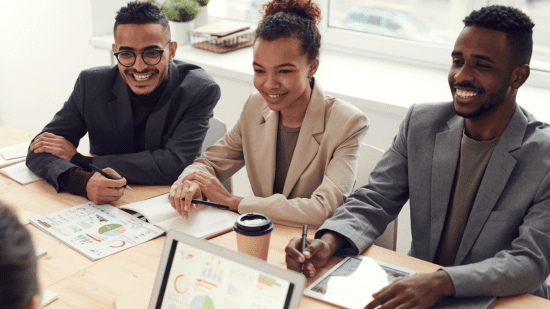 One female and two male professionals in an office. Navigate the job market confidently with our ATS-friendly resumes, ensuring you pass the automated filters and get noticed by top employers."Expert Resume Writing for Six-Figure Jobs